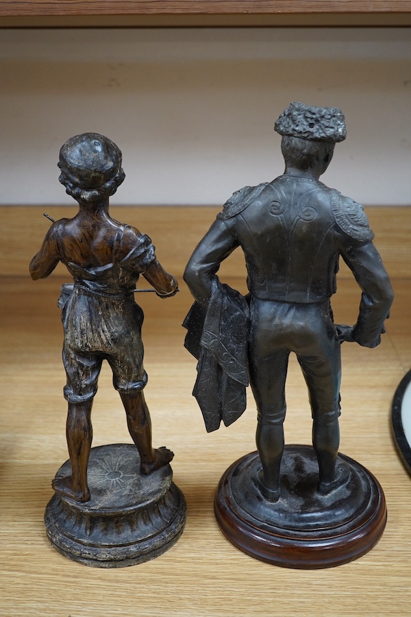 Two spelter figures, including a matador raised on turned wood base, 38cm high. Condition - fair